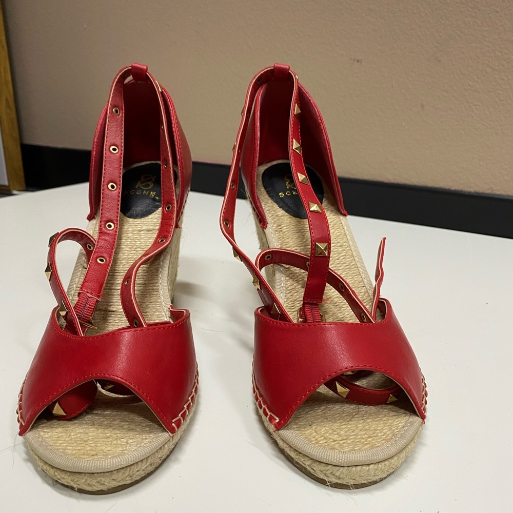 Lace up red espadrilles gently used